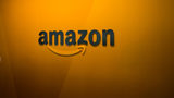 An Amazon logo is seen inside the Amazon corporate headquarters on June 16, 2017 in Seattle, Washington. Amazon is hiring for more than 200 work-from-home positions.
