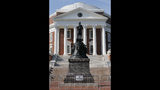 In this Monday, Aug. 6, 2018 photo, a No Trespassing sign is displayed in front of a statue of Thomas Jefferson in Charlottesville, Va., at the park that was the focus of the Unite the Right rally.