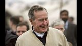 President George Bush visits a tent camp for earthquake survivors on the outskirts of Islamabad on January 17, 2006 in Pakistan. Bush, 81, came as a special envoy for the United Nations.