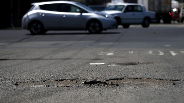 Woman Places Christmas Tree In Pothole After It Goes Unfixed Woman Places Christmas Tree In Pothole After It Goes Unfixed